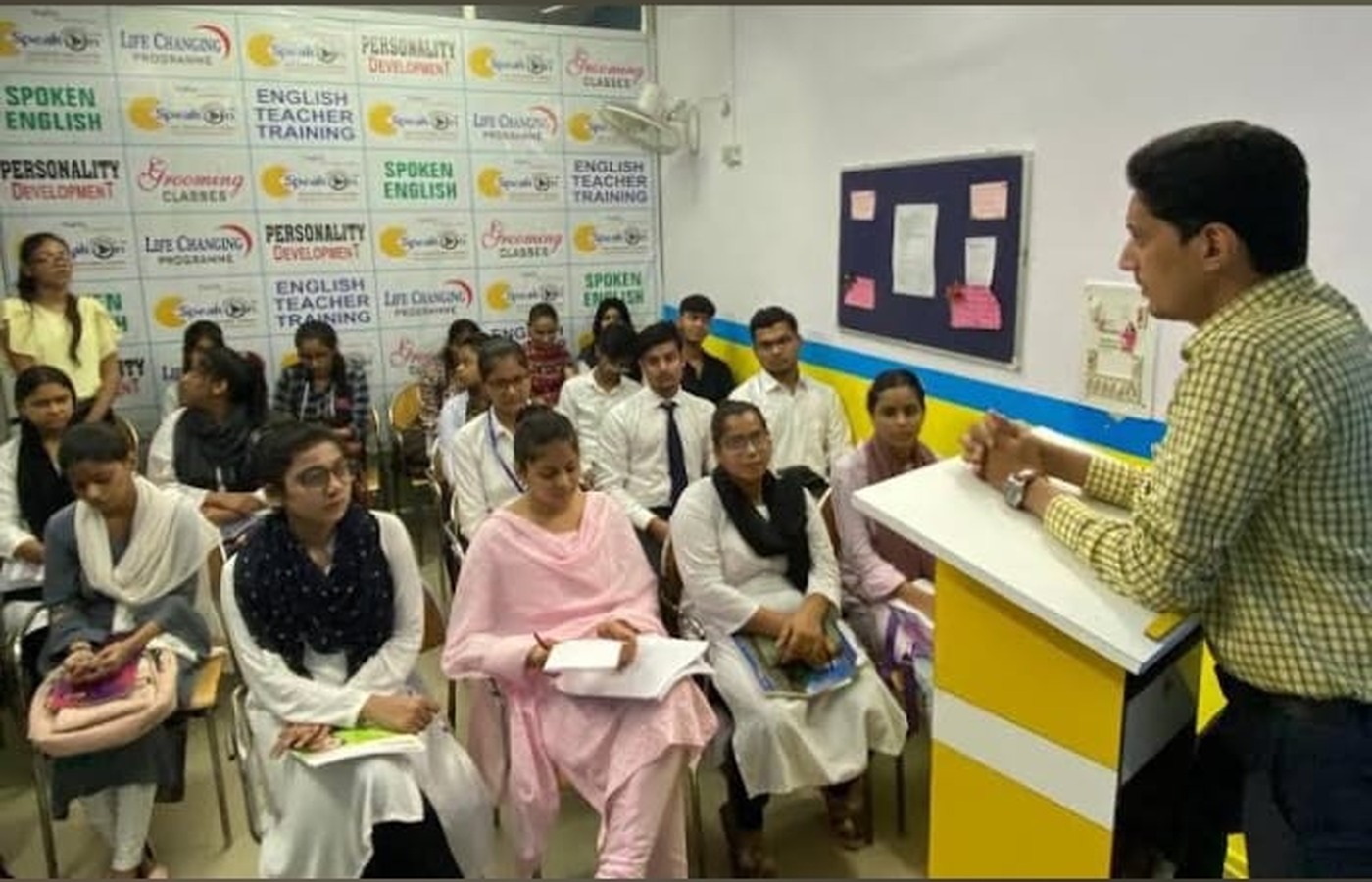 Speak On classroom with students and trainer